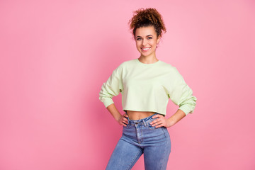 Portrait of her she nice-looking attractive lovely pretty charming content slim cheerful cherry girl wearing green crop top posing isolated over pink pastel color background