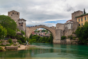 Fototapeta na wymiar Old bridge above the Neretva River in Mostar, Bosnia and Hercegovina