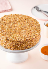 Cake with sesame seeds and apricot jam.