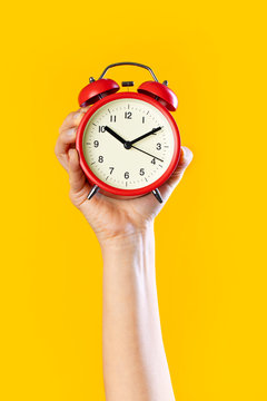 Hand With Alarm Clock