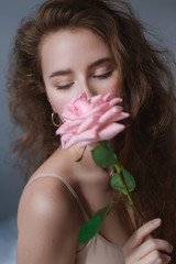 Stock photo - Sweet girl with pink rose 
