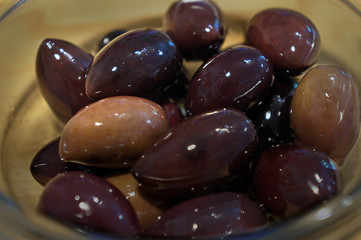 close up of a bowl with kalamata olives