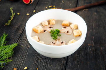 Closeup on mushroom cream soup with crackers 