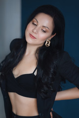 Portrait of beautiful young brunette girl with makeup