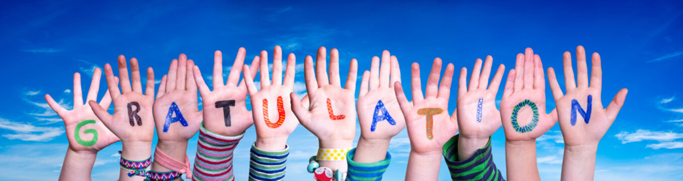 Children Hands Building Colorful German Word Gratulation Means Congratulations. Blue Sky As Background