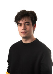 Portrait of smiling young man, isolated on white background