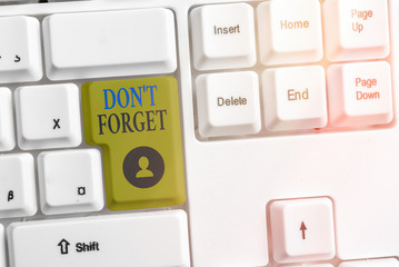 Writing note showing Dont Forget. Business concept for used to remind someone about an important...