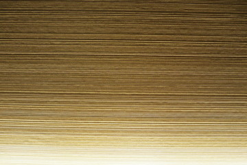 Glossy wooden wall in dark brown and golden tone for interior and warm luxury background Cool banner on page and cover