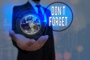 Writing note showing Dont Forget. Business concept for used to remind someone about an important...