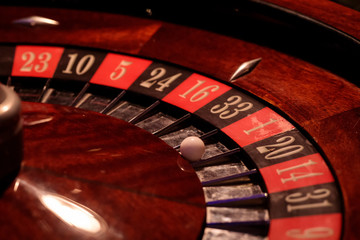 Casino roulette wheel closeup with numbers