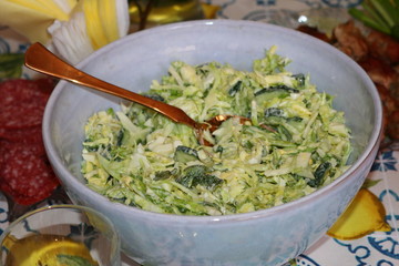 Fresh cabbage and cucumber salad on the festive table