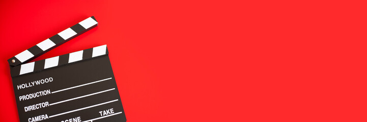 film clapper on red background