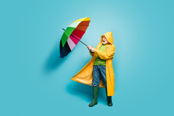 Full length body size view of his he nice irritated grey-haired man wearing yellow topcoat...