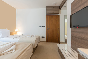 Interior of a modern double bed hotel bedroom