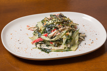 Shredded zucchini salad with chicken and black sesame dressing