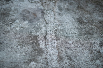 White old cement wall concrete backgrounds textured. Abstract vintage texture. Background from cracks, breaks, stains. Grunge cracks, damage