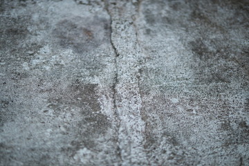 White old cement wall concrete backgrounds textured. Abstract vintage texture. Background from cracks, breaks, stains. Grunge cracks, damage