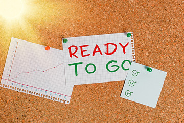 Writing note showing Ready To Go. Business concept for prepared and suitable to move or to travel...