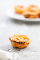 portuguese egg tart pastel de nata on ceramic background