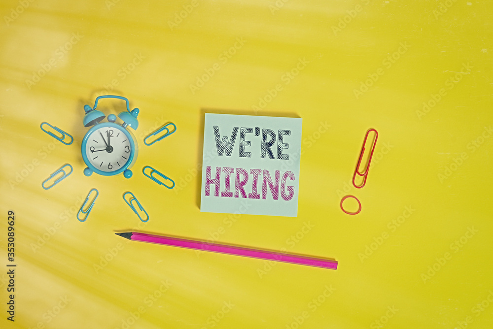 Poster writing note showing we re hiring. business concept for process of reviewing applications and findin