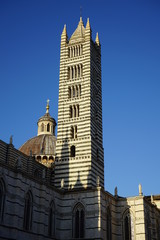 Fototapeta na wymiar Tower Bell of the Duomo in the city of Siena, Tuscany,Italy