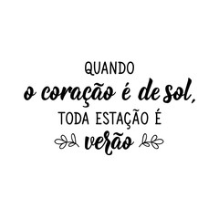 Fototapeta premium When the heart is sunny, every season is summer in Portuguese. Lettering. Ink illustration. Modern brush calligraphy.