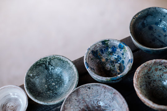 Top view of pottery clay ceramic small cups handmade terracotta.