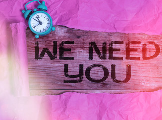 Writing note showing We Need You. Business concept for asking someone to work together for certain...