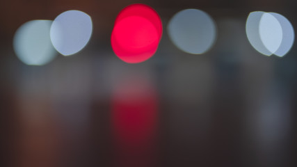 Night traffic light bokeh on road