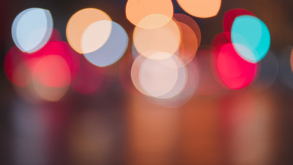 Night traffic light bokeh on road