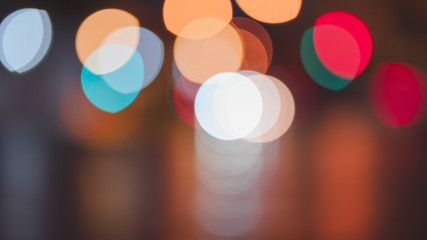 Night traffic light bokeh on road