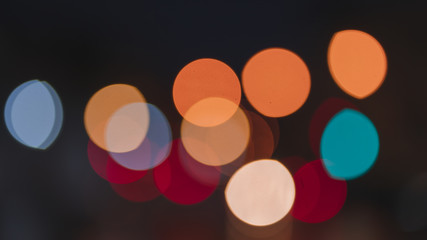 Night traffic light bokeh on road