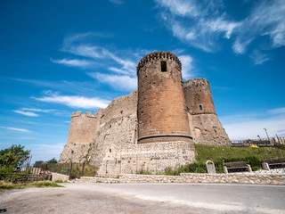 Fototapeta na wymiar Medieval Castle of Lettere with blue sky and clouds. Naples, Campania, Italy