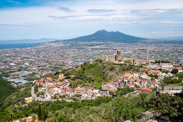 Fototapeta na wymiar Medieval Castle of Lettere with the Vesuvius and metropolitan city of Naples in background. Lettere, Naples, Campania, Italy