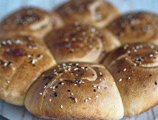 Homemade cake.Rolls with filling on a wooden table with a napkin. close up.