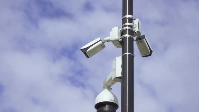Security cameras on a pillar