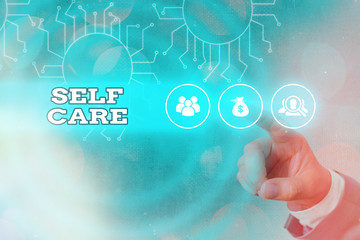 Writing note showing Self Care. Business concept for the practice of taking action to improve one s...