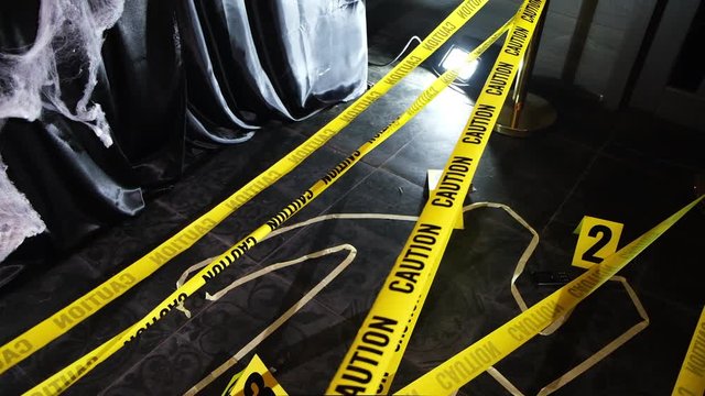 The yellow ribbon caution crime scene murder silhouette evidence haloween