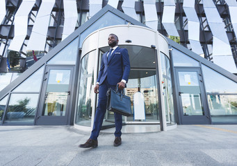 African American Businessman Walking After Work In Urban Area