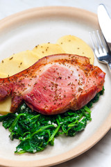 smoke meat with spinach and potato dumplings