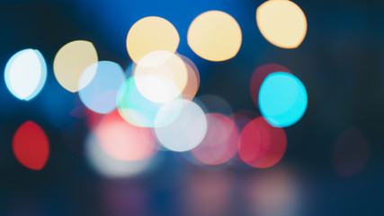 Night traffic light bokeh on road