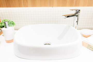Bathroom interior with sink and faucet