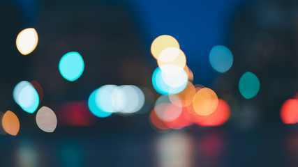 Fototapeta premium Night traffic light bokeh on road