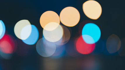 Night traffic light bokeh on road