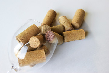 Many bottle caps from different wine producers.