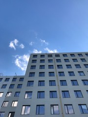 modern office building on a background of clouds