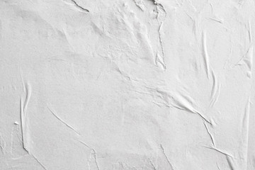 Blank white crumpled and creased paper poster texture background