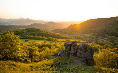 View from the top of (Holy vrch) hill during sunset. Spring scenery in Central Bohemian Highlands,...
