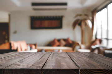 Empty wooden desk space platform over reception room background. For product display montage.