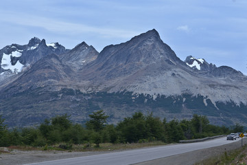 Naklejka premium Ushuaia, City at the End of the World, Argentina. This is place is full of mountains and rivers and snow around the city center, and the city center is a little town, look like more a village than a c